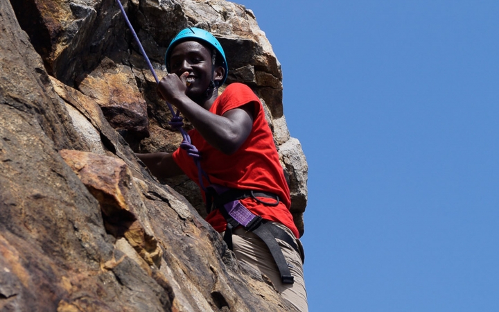 teens learn rock climbing skills in maine
